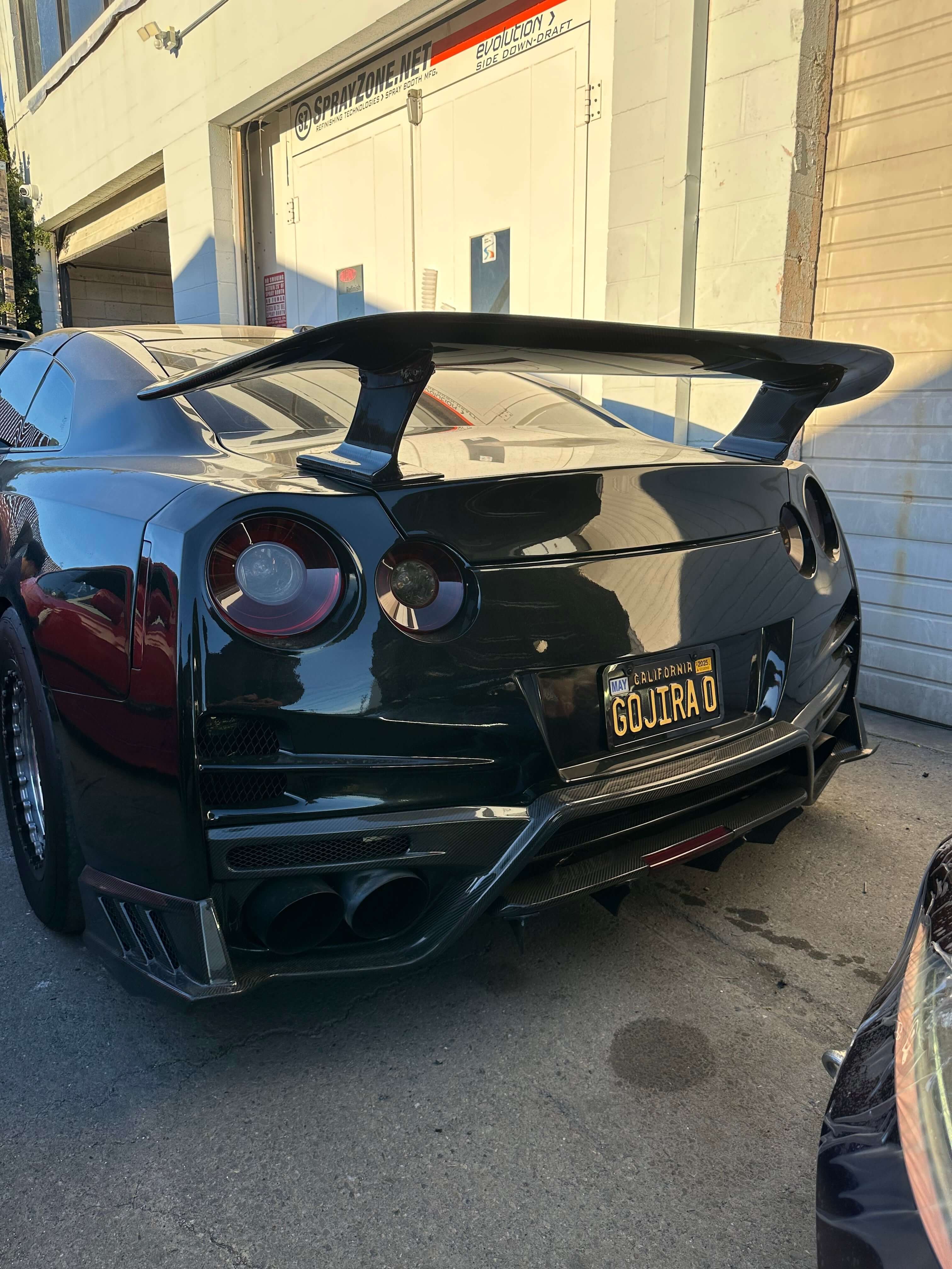TS-Style Carbon Fiber Rear Diffuser W/BrakeLight - Nissan GTR R35.