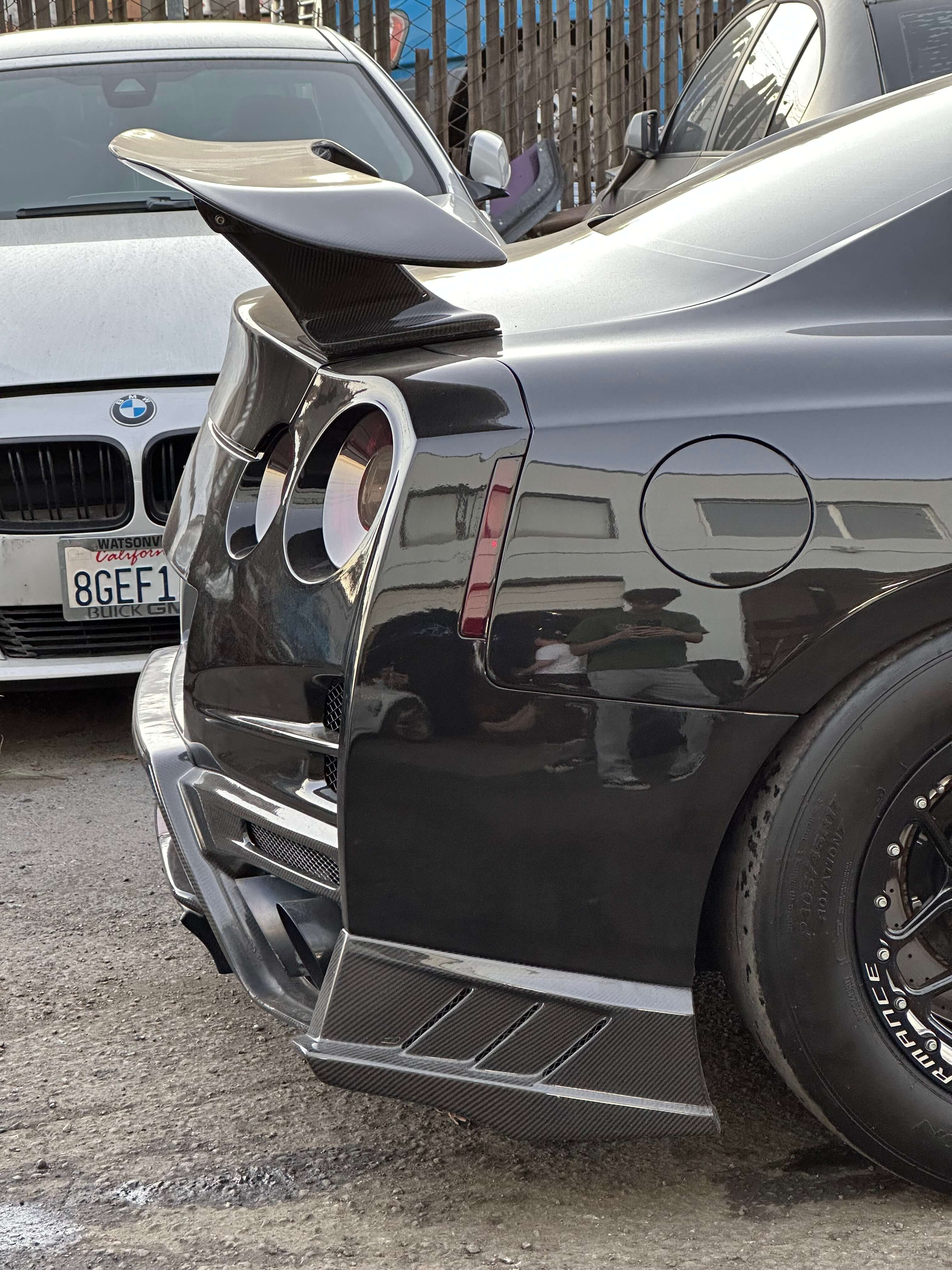 TS-Style Carbon Fiber Rear Diffuser W/BrakeLight - Nissan GTR R35.
