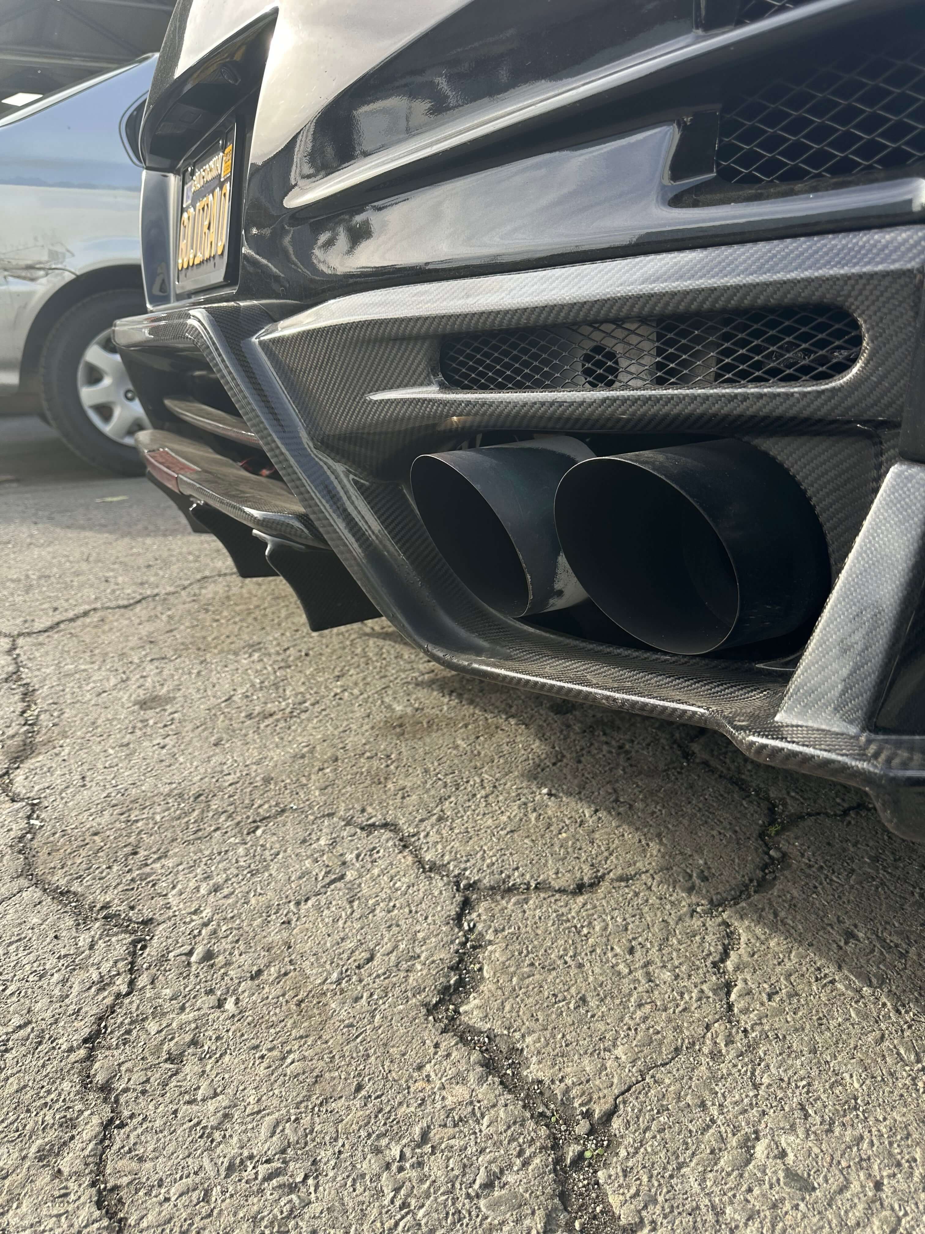 TS-Style Carbon Fiber Rear Diffuser W/BrakeLight - Nissan GTR R35.
