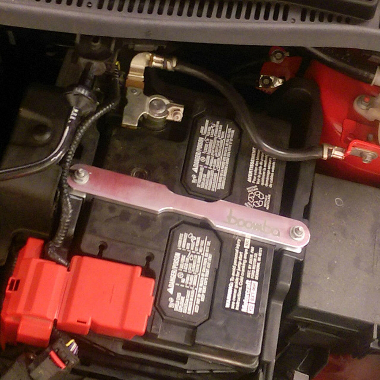 FIESTA ST BATTERY HOLDER.