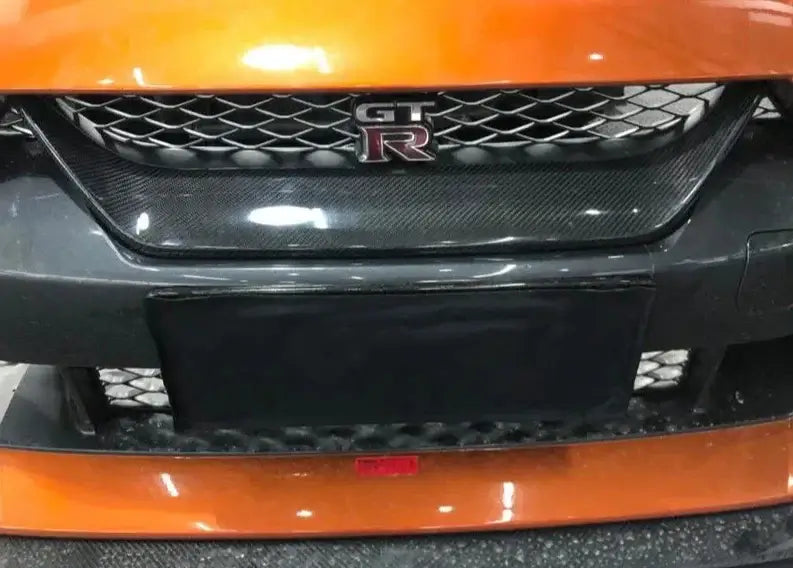Carbon Fiber Front Grill Trim Cover - Nissan R35 GTR.
