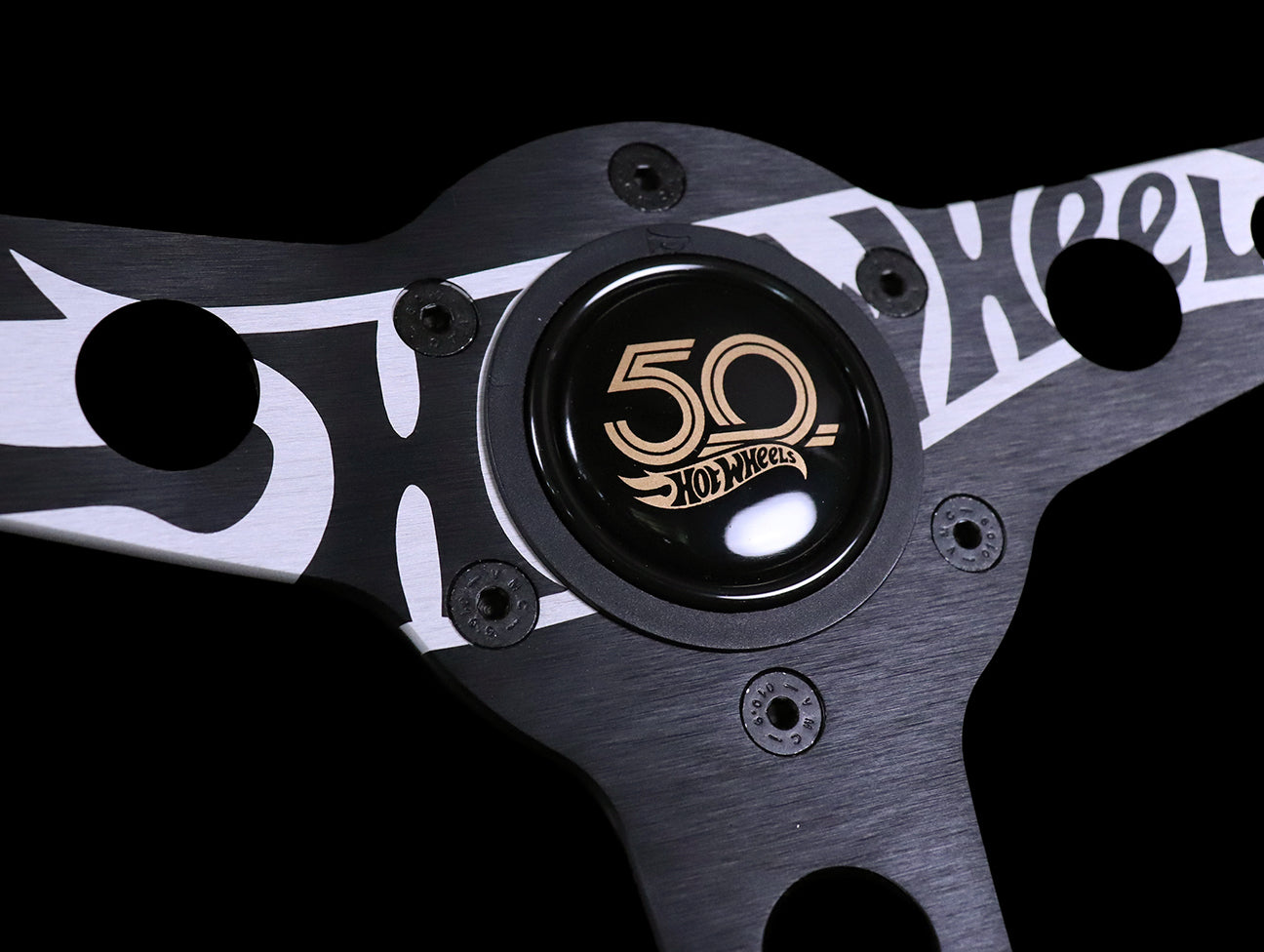 Momo X Hot Wheels Limted Edition Steering Wheel - 350mm Black Alcantara Suede w/ Gold Stitching.