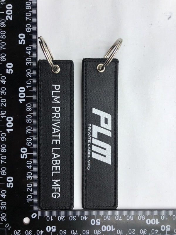 PLM Keychain Jet Tag.