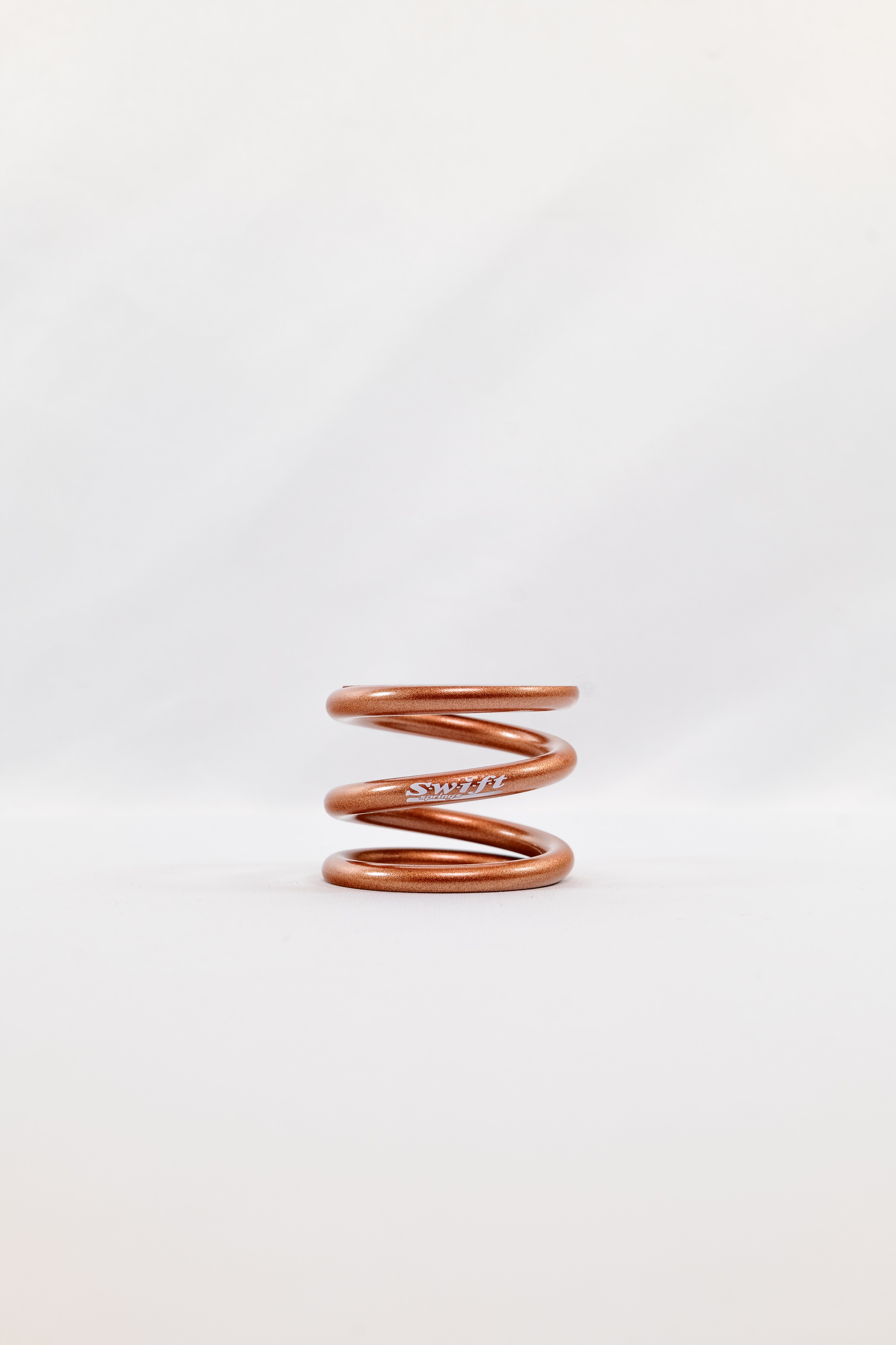 Round Wire Short Bump Spring - 1.5" Length | 1.99" OD | 500lbs/inch