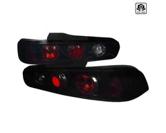 Spec-D Taillights (Glossy Black Housing/Smoke Lens) Acura Integra Hatchback 1994-2001.