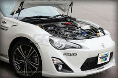 GReddy Carbon-Fiber  Hood Lifter Kit | 2013-2021 BRZ/FR-S/86 (18510101).