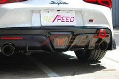 Rexpeed Carbon Reverse Light Badge | 2020-2021 Toyota Supra (TS19G).