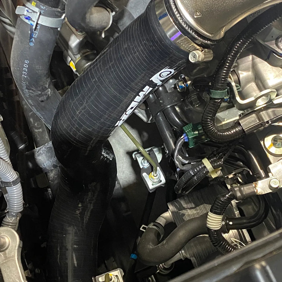 Installed silicone intercooler hose on FK8 engine bay for upgraded airflow