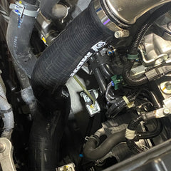 Installed silicone intercooler hose on FK8 engine bay for upgraded airflow