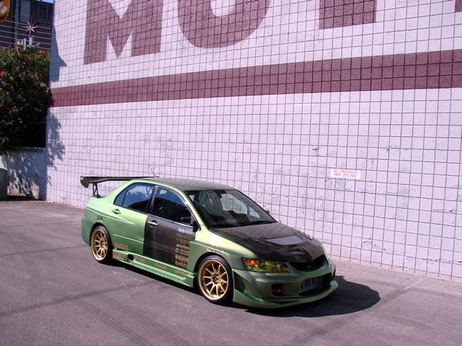 Seibon Carbon Fiber Doors | 2003-2006 Mitsubishi Lancer Evolution 8/9 (DD0305MITEVO8F/R).