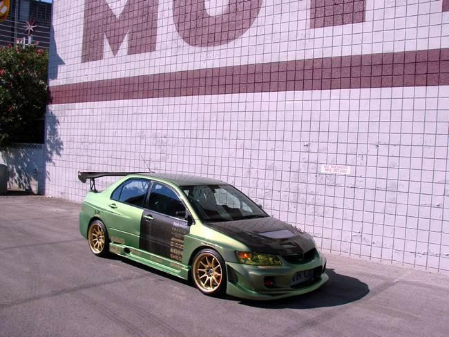 Seibon Carbon Fiber Doors | 2003-2006 Mitsubishi Lancer Evolution 8/9 (DD0305MITEVO8F/R).
