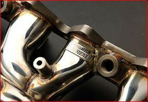 Tomei EXPREME Exhaust Manifold Kit | 1996-2006 Mitsubishi Evo 4-9 (TB6010-MT01A).
